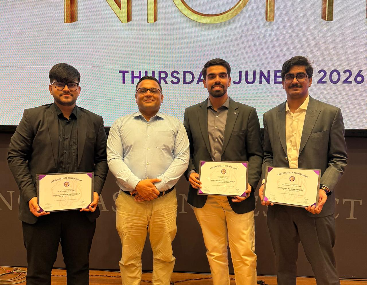 AspidIoT team receiving the Best Capstone Design Project award for Computer Engineering